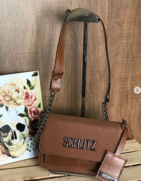 bolsa feminina schutz alca corrente pequen